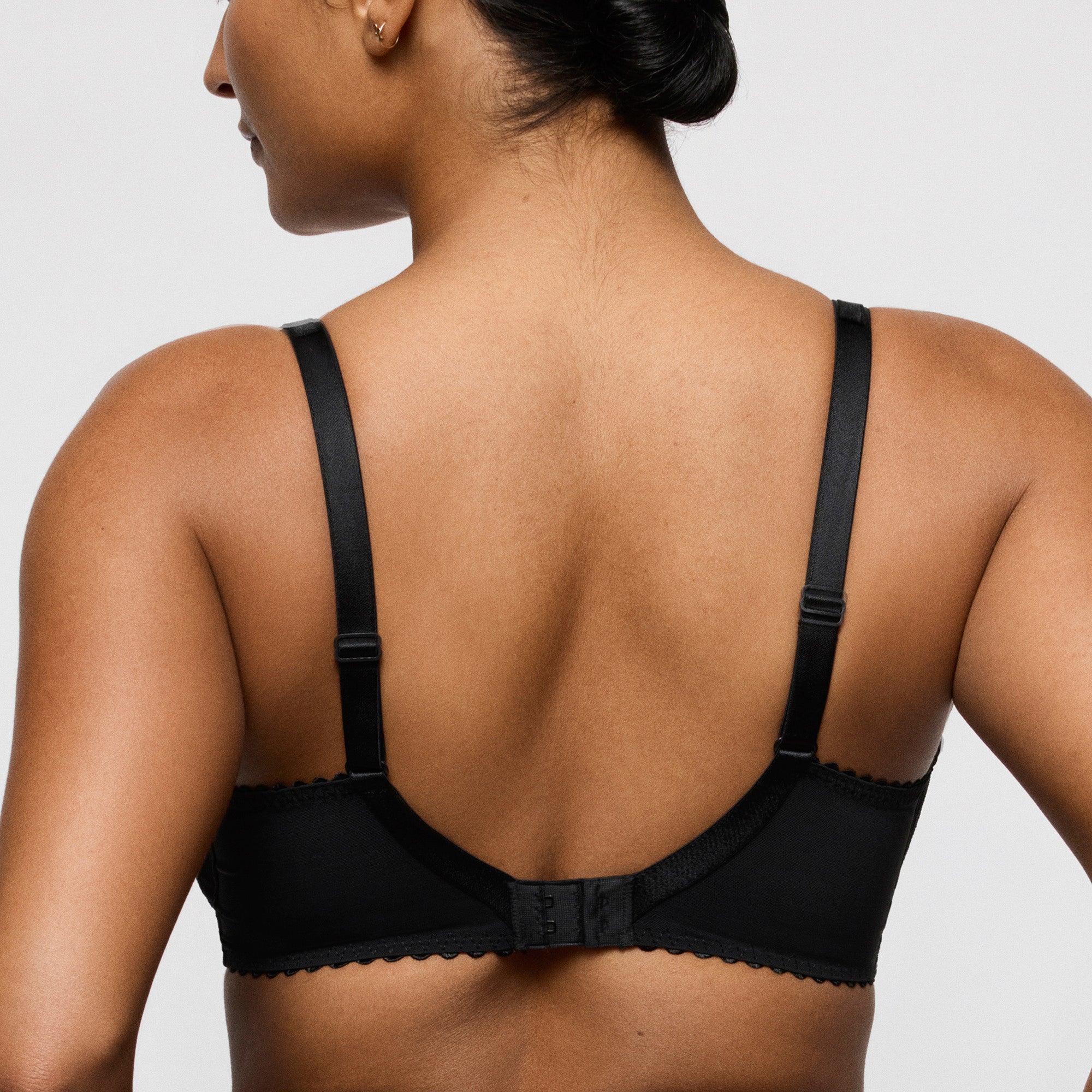 PrimaDonna Naica kaarituelliset toppaamattomat kokokuppiset pitsiset rintaliivit musta takaa