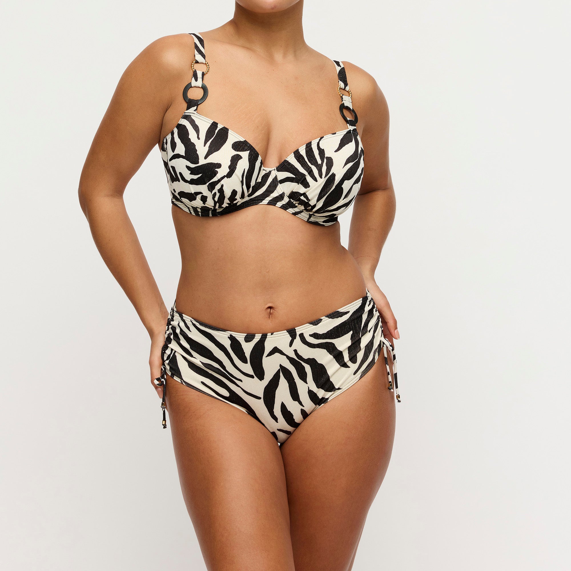 PrimaDonna Swim Dalice korkeat säädettävät bikinihousut seeprakuosi kimalle mallin päällä